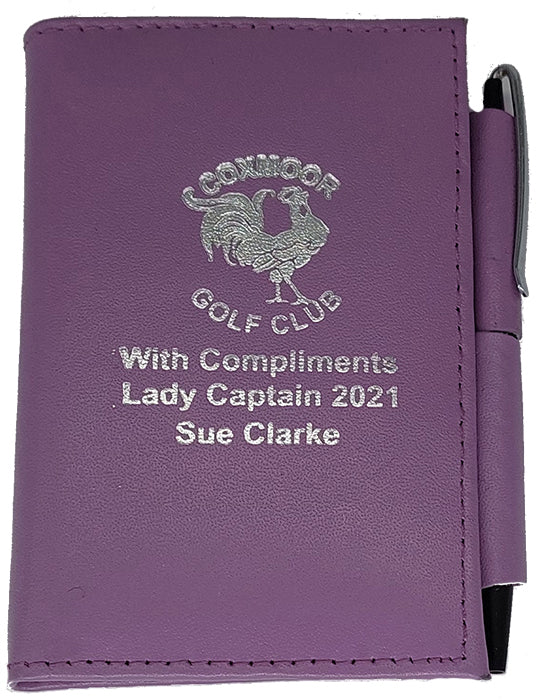 Leather lilac Notebook with pen foil blocked form £4.10. Min qty 10.